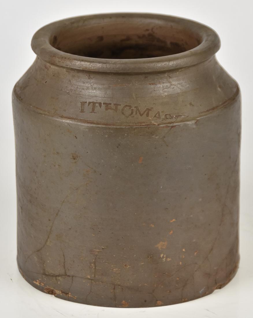 Isaac Thomas, Ky. Stoneware Jar: Maysville, Kentucky potter, straight sided in flat brown glaze stamped I THOMAS on shoulder, 5 1/2" diameter x 6 1/4" high. Condition minor chip on base, likely done during firing.
