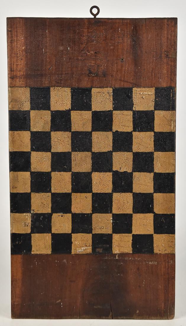 Folk Art Painted Game Board: Checker board type in original black and white paint with varnished ends and original over varnish, nice old patina. Late 19th Century.10 x 18 1/2". Condition Fine.
