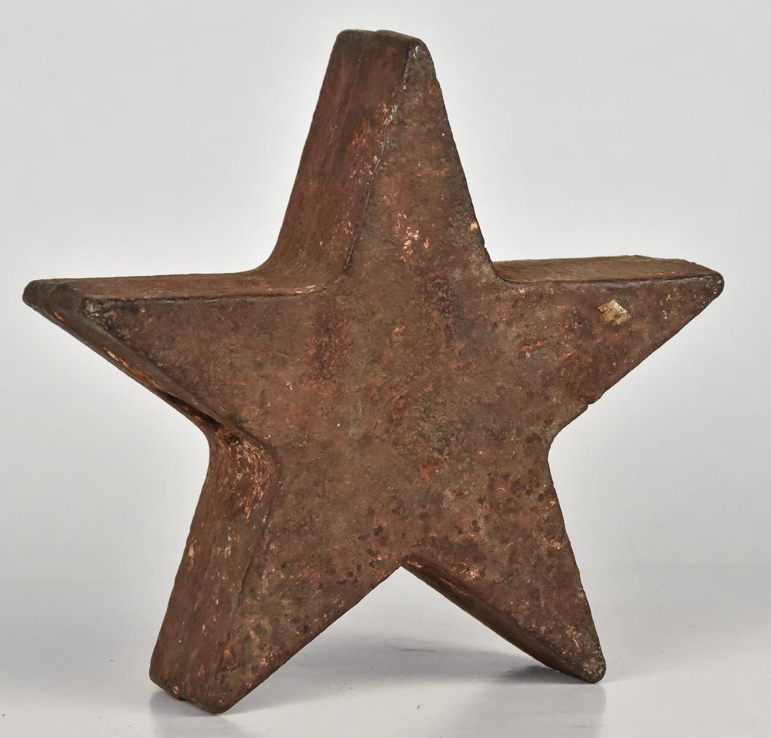 Cast Iron Star Windmill Weight: In the form of a five pointed star with mounting hole, 10 1/2 x 10" high. Condition some oxidation as expected, else Fine.