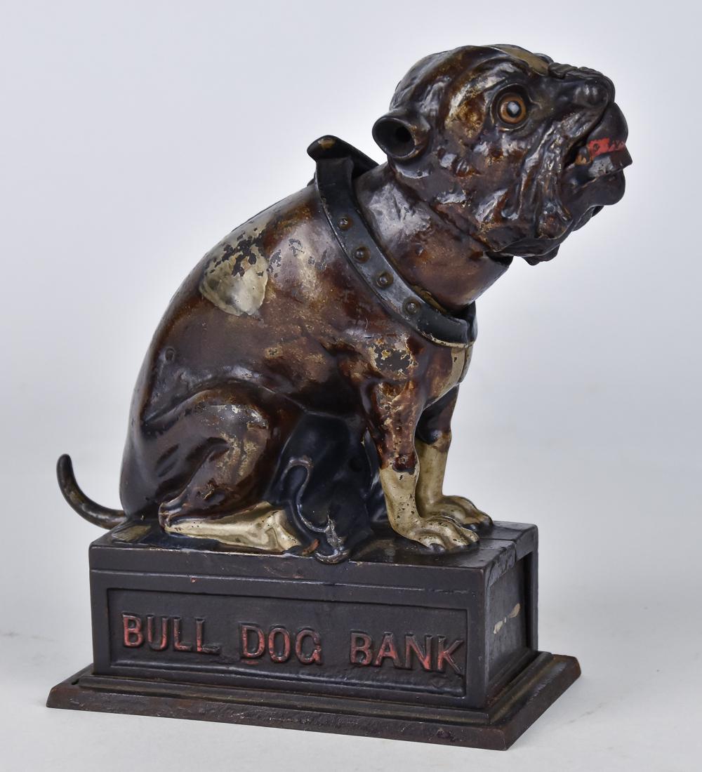 Cast Iron Bull Dog Mechanical Bank: J. & E. Stevens Co., in original polychrome painted finish, marked Bull Dog Bank on right side of base, marked Patd. Apr. 27, 1880 on underside, base is 5 1/2 x 3", 8 3/4" high. Condition working, pai