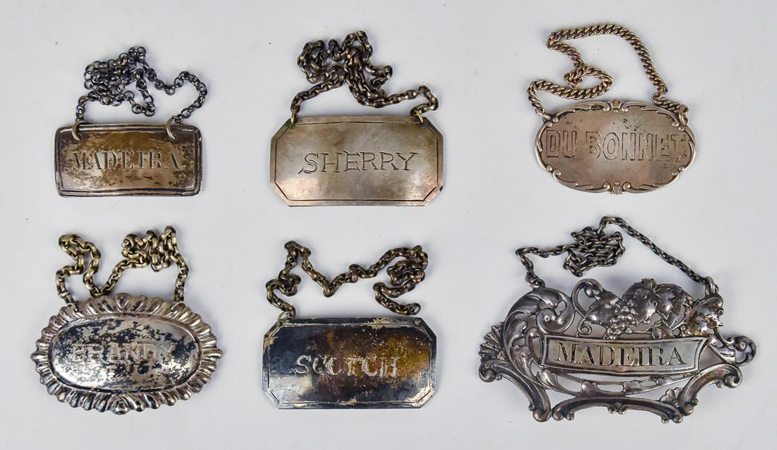 Silver Bottle Labels: Lot of six, including a marked Gorham Sterling Madeira; plus marked Sterling Du Bonnet; plus hallmarked English Georgian Madeira; and three Continental silver labels all hallmarked with Sherry Scotch 