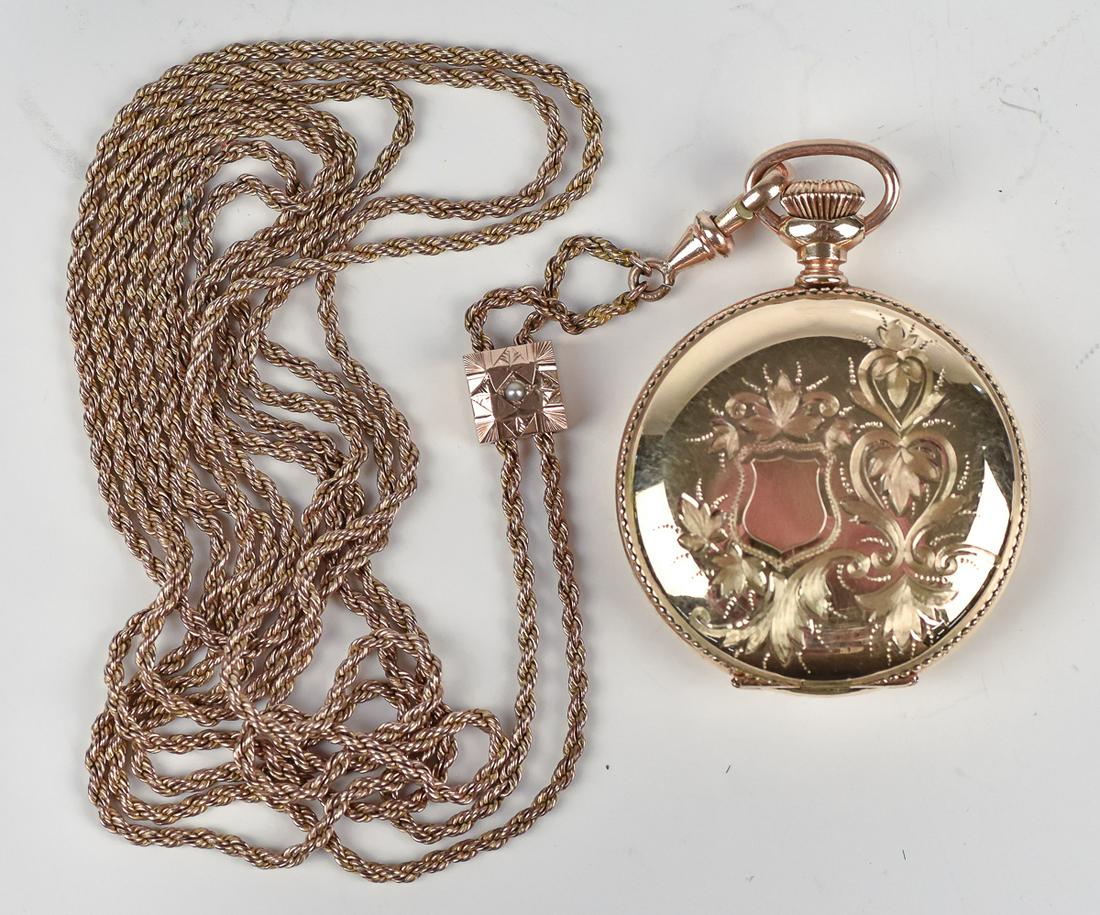 Hamden Molly Stark Gold Filled Ladies Pocket Watch &: Closed face marked on enameled dial and on works, front with floral engraving, rear with landscape with cottage, Duber Special case, 1 1/4" diameter with 24 1/2" long braided gold filled chain with sl