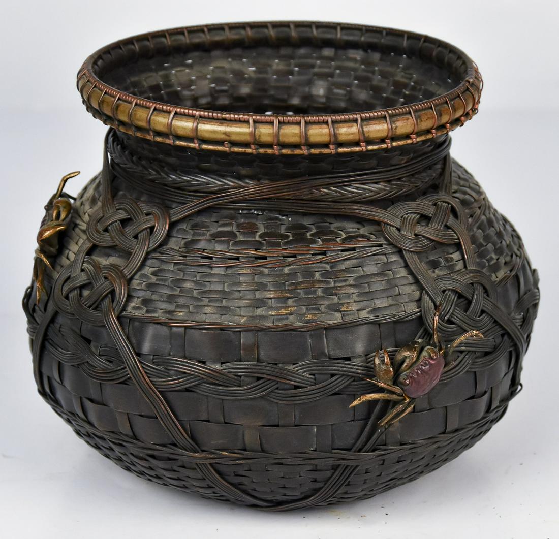 Meiji Woven Brass Basket: Beautifully and intricately woven brass basket with fine brown patina and two full body crabs attached to sides, each in bi-color patina, 6" diameter x 5 1/4" high. Condition Fine.