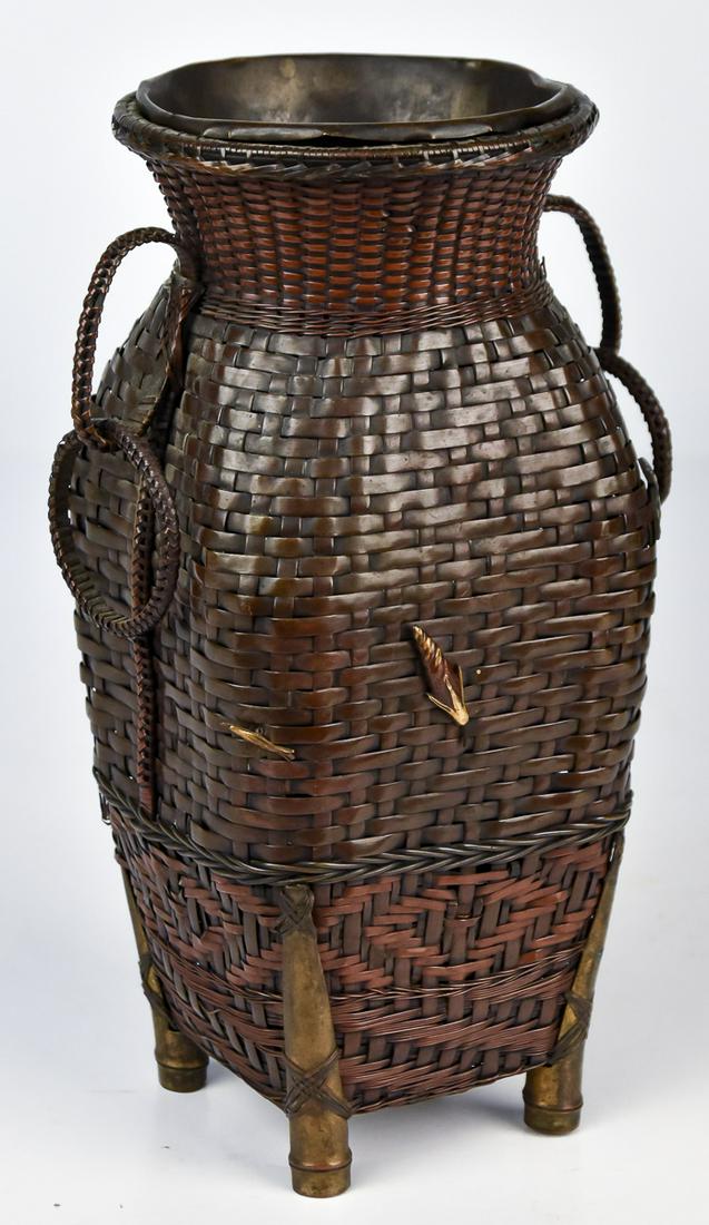 Meiji Woven Brass Basket: Beautifully and intricately woven brass basket with fine three color patina and square baluster form, ton four turned feet with paired woven double ring handles at shoulder, removable brass flower pot
