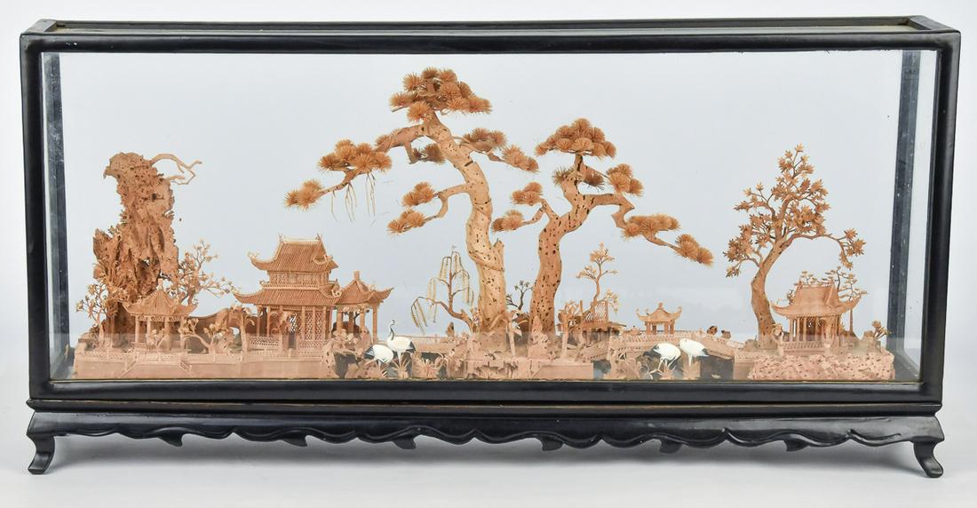 Chinese Cork Landscape: Lake setting with two building, two bridges, several trees of different types, cranes in water, under original glass and ebonized wood case with cabriol legs, 23 12 x 4 x 11 1/2" high. Condition Fine.