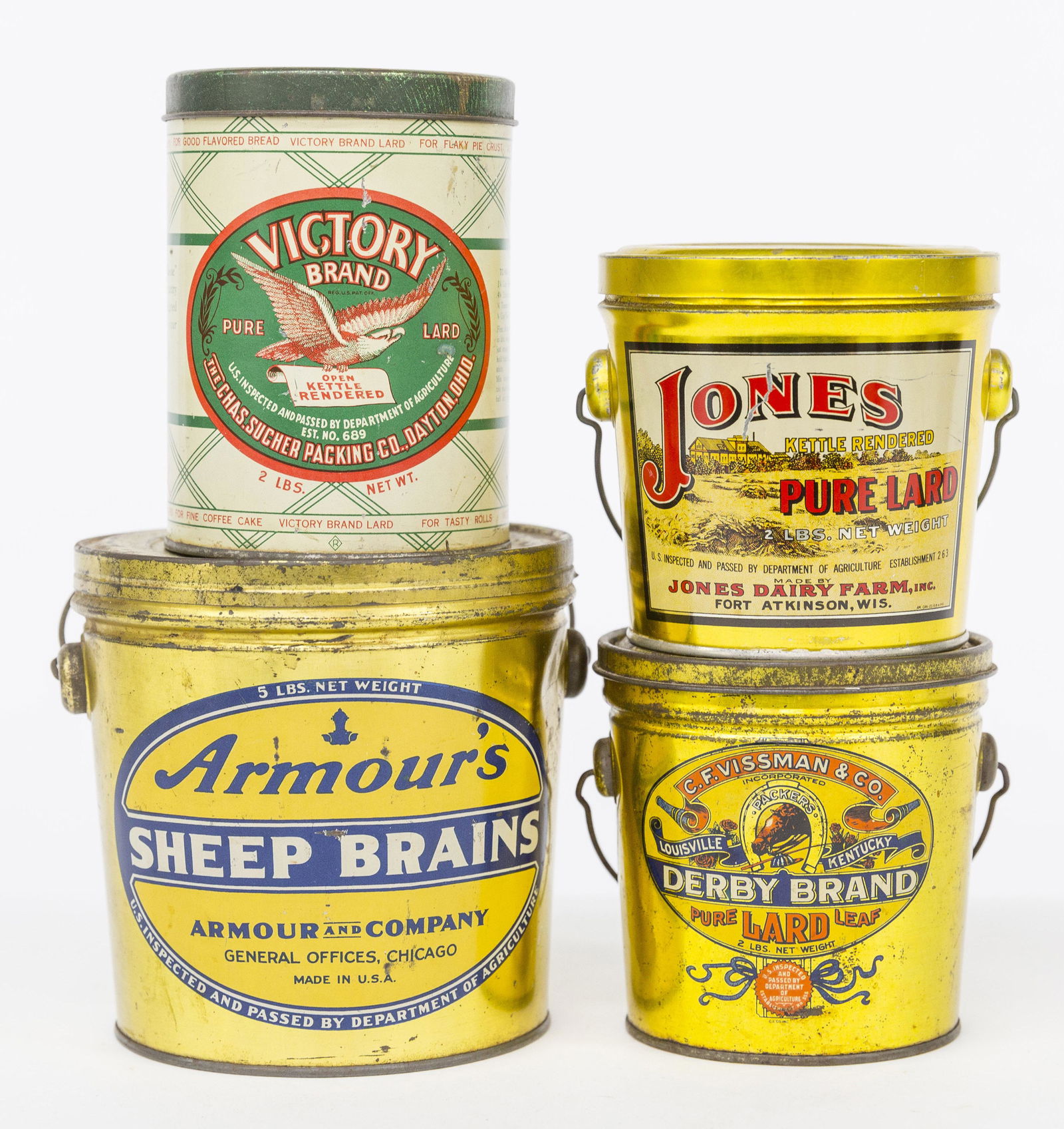 Four Lard Cans: All chromolithographed tin, including C.F. Vissman & Co. Derby Brnd Lard, Louisville Ky. With wire bale handle, 4 3/5" diameter & high; plus Victory Brand, The Chas. Sucher Packing Co., Dayton, Ohio,