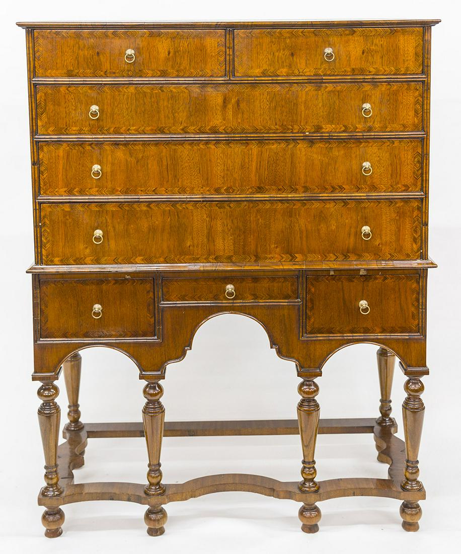 Maitland Smith William & Mary Highboy: Mahogany with herring-bone cross banding, two piece with upper having two over three graduated drawers, signed on inside of top center drawer, lower section with three drawers, all with brass knobs, b