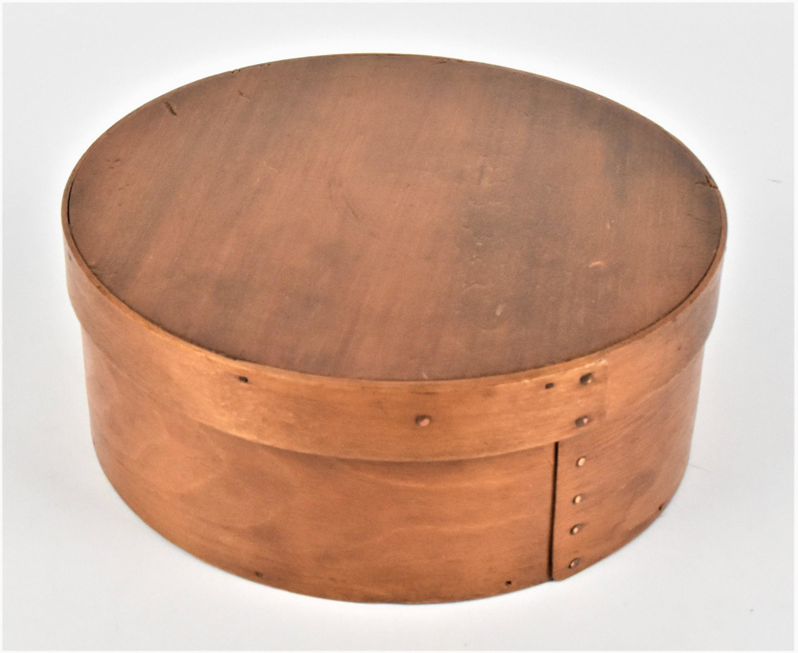 Bentwood Pantry Box: Maple with copper brads, white pine lid and base, in old cleaned finish, 8 3/4" diameter x 3 1/2" high. Condition Fine.