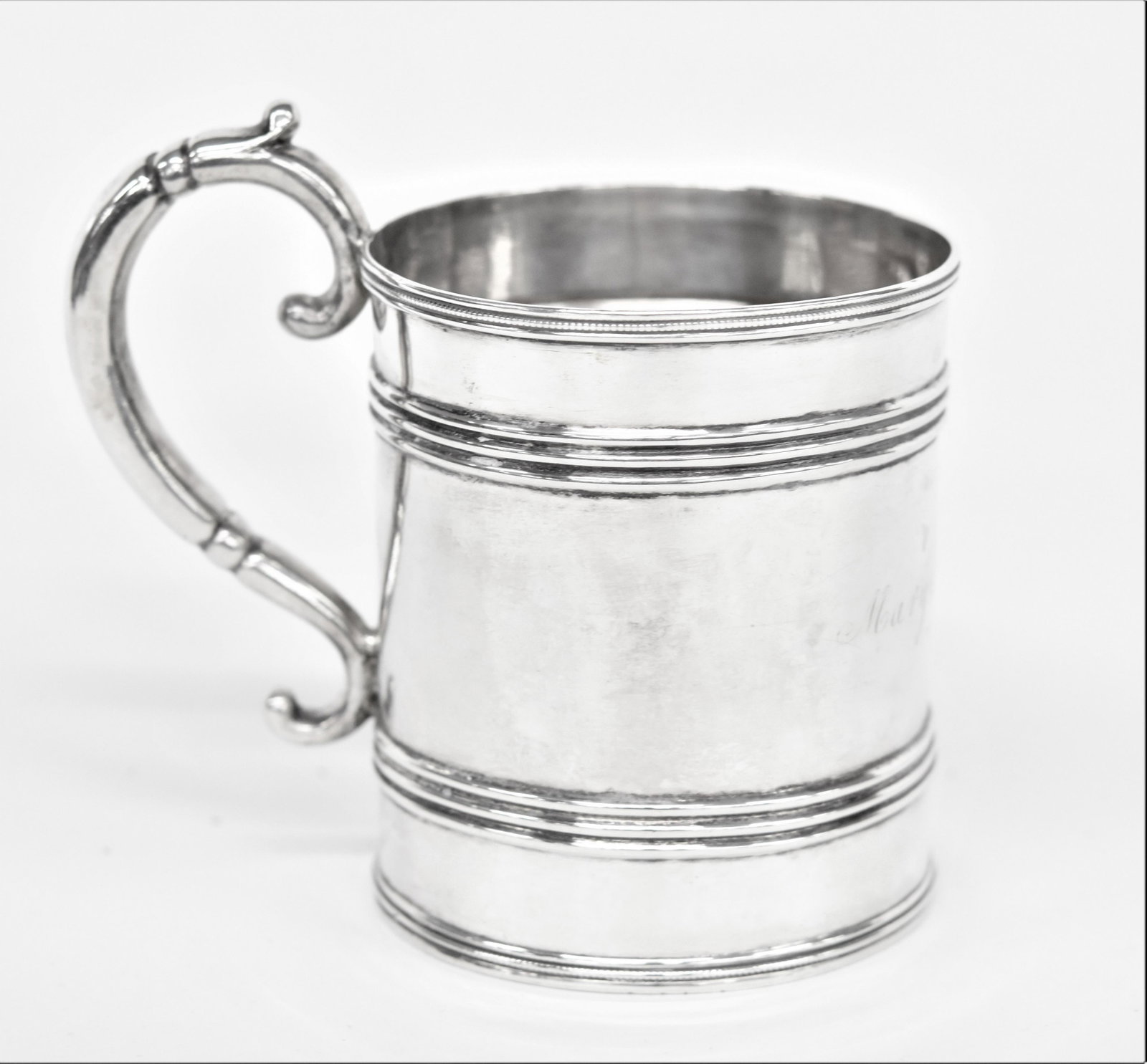 South Carolina Gregg & Veal Coin Silver Cann: Straight sided cann with annular banding and beading at lip and base, fine C scroll handle, marked on base Gregg & Veal in rectangular touch and with two smaller touch marks a spread winged eagle and 