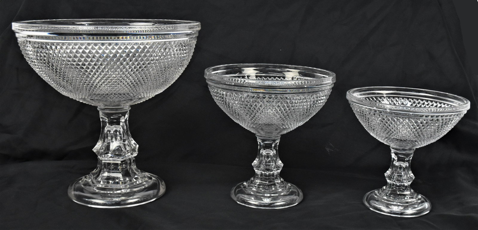 Flint Diamond Point Compotes: Graduated set of three, circa 1840 with largest 10 1/4" diameter x 10" high and smallest 6 1/4" diameter & high. Condition all Fine.