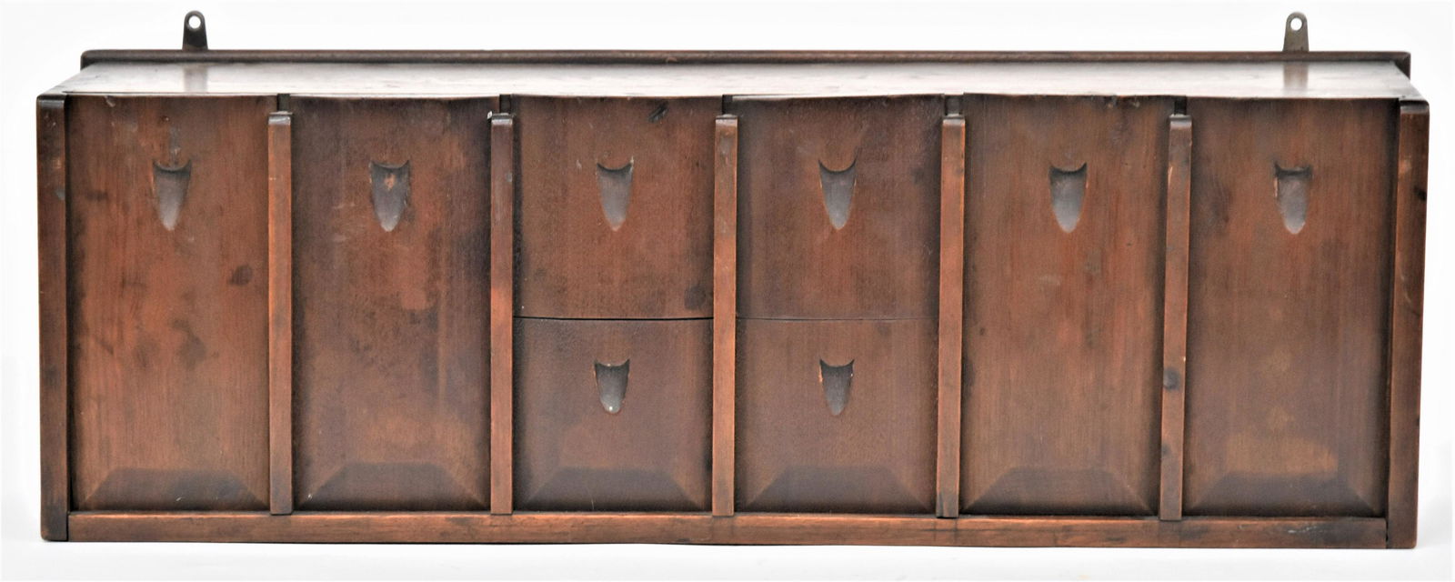 Truly Outstanding Dovetailed Candle Box: Walnut with 8 chamfered sliding lids in six rows with central four stacked, carved signature on base: Sept. 1, 1874 By R. Ramsey/Wilmington (Ohio?), fine old patina, 28 x 9 1/2 x 7 1/2" high. Each com