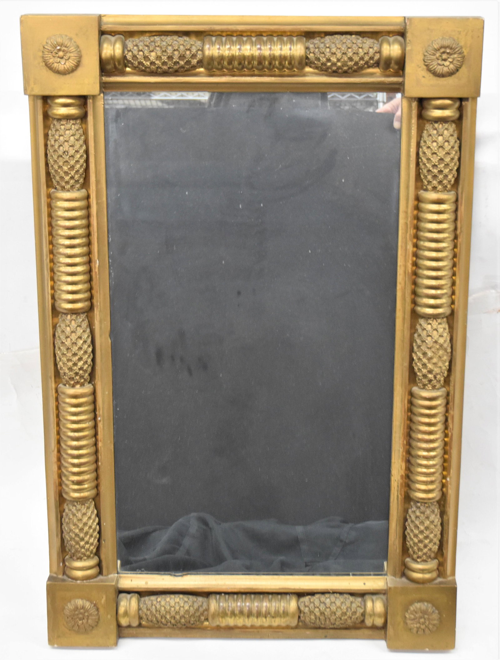Federal Gilt Mirror: Circa 1830-40 with half turned columns with gesso pineapples, corner blocks with rosettes, 23 1/2 x 35 3/4" high. Condition Fine.