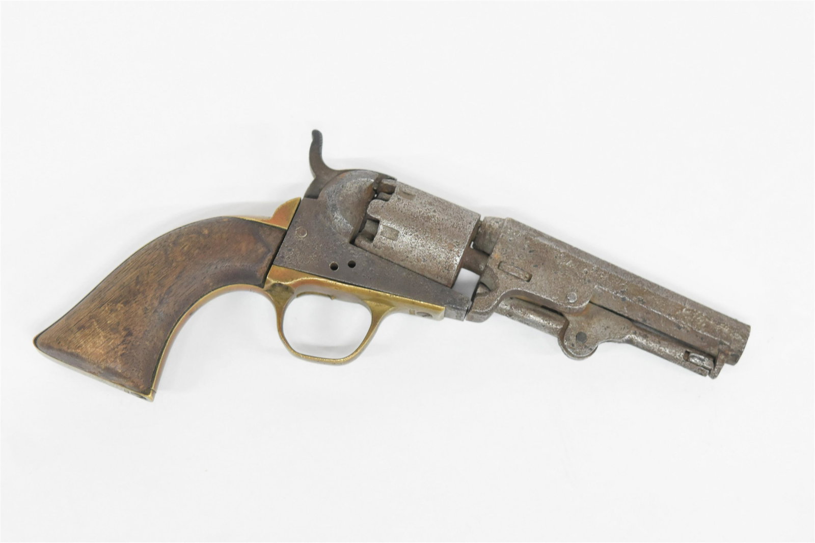 Relic Colt Percussion Revolver: Circa .40 caliber octagonal barrel, marked Address Saml. Colt with remaining part unreadable, five shot with walnut grips, brass trigger guard and back-strap, matching serial numbers 217108, 8 1/2" lo