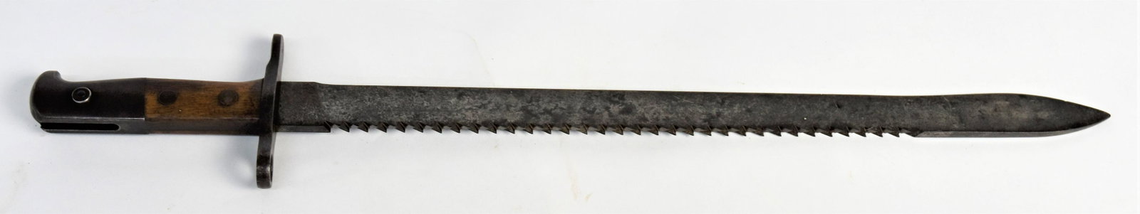 1914 Swiss Army Bayonet: Sawback Pioneer bayonet, marked Waffenfabrik Neuhausen on right ricasso, with steel guard marked 62118, walnut grips, 23 7/8" long. Nice brown patina. Condition Fine.