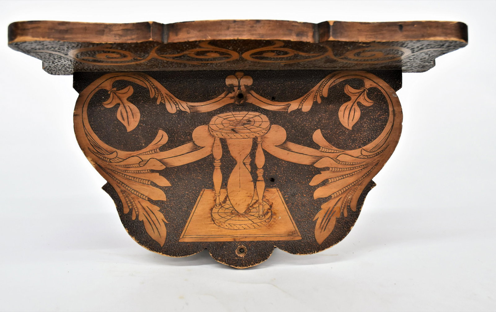 Pyro Decorated Hanging Odd Fellows Shelf: Decorated with hour glass and floral scroll work on stippled ground, scroll cut, marked on back with three linked chain loops, likely Odd Fellows Lodge shelf17 1/2 x 6 x 9 3/4" high. Condition Fine.