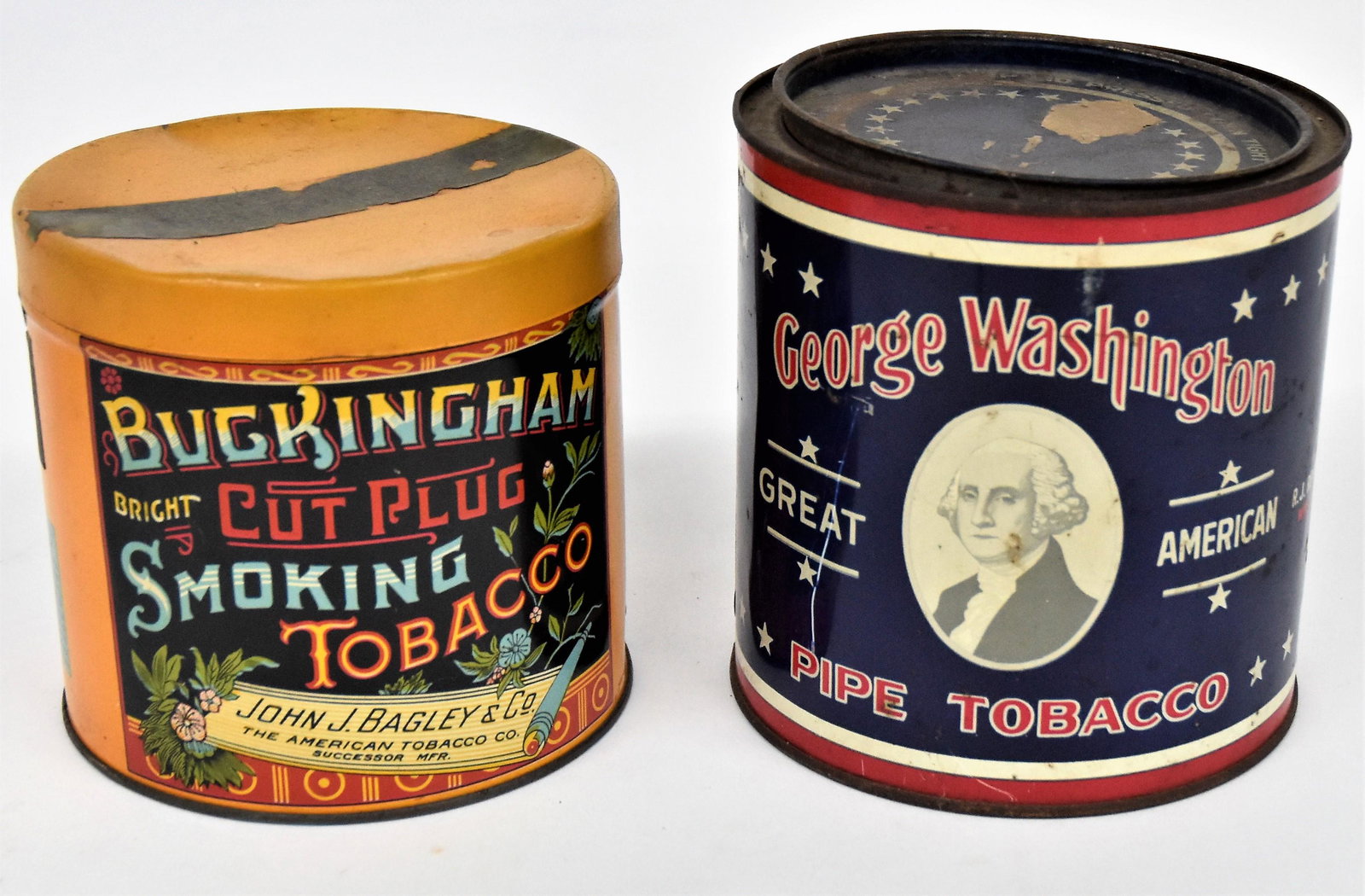 Two Early Tobacco Tins: Both chromolithographed cylinder form, including George Washington Pipe, R.J. Reynolds, 5 1/8" diameter x 5 1/2" high; and Buckingham Cut Plug Smoking Tobacco, John J. Bagley & Co., The American Tobac