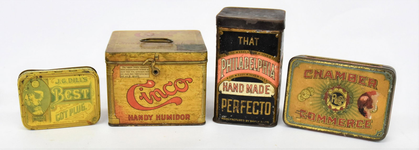 Four Tobacco Tins: All chromolithographed including Cinco; J.G. Dill's Best Cut Plug; Chamber of Commerce; and That Philadelphia Hand Made Perfecto (cigars). 1st-3rd with hinged lid, 4th friction lid, largest is Cinco, 