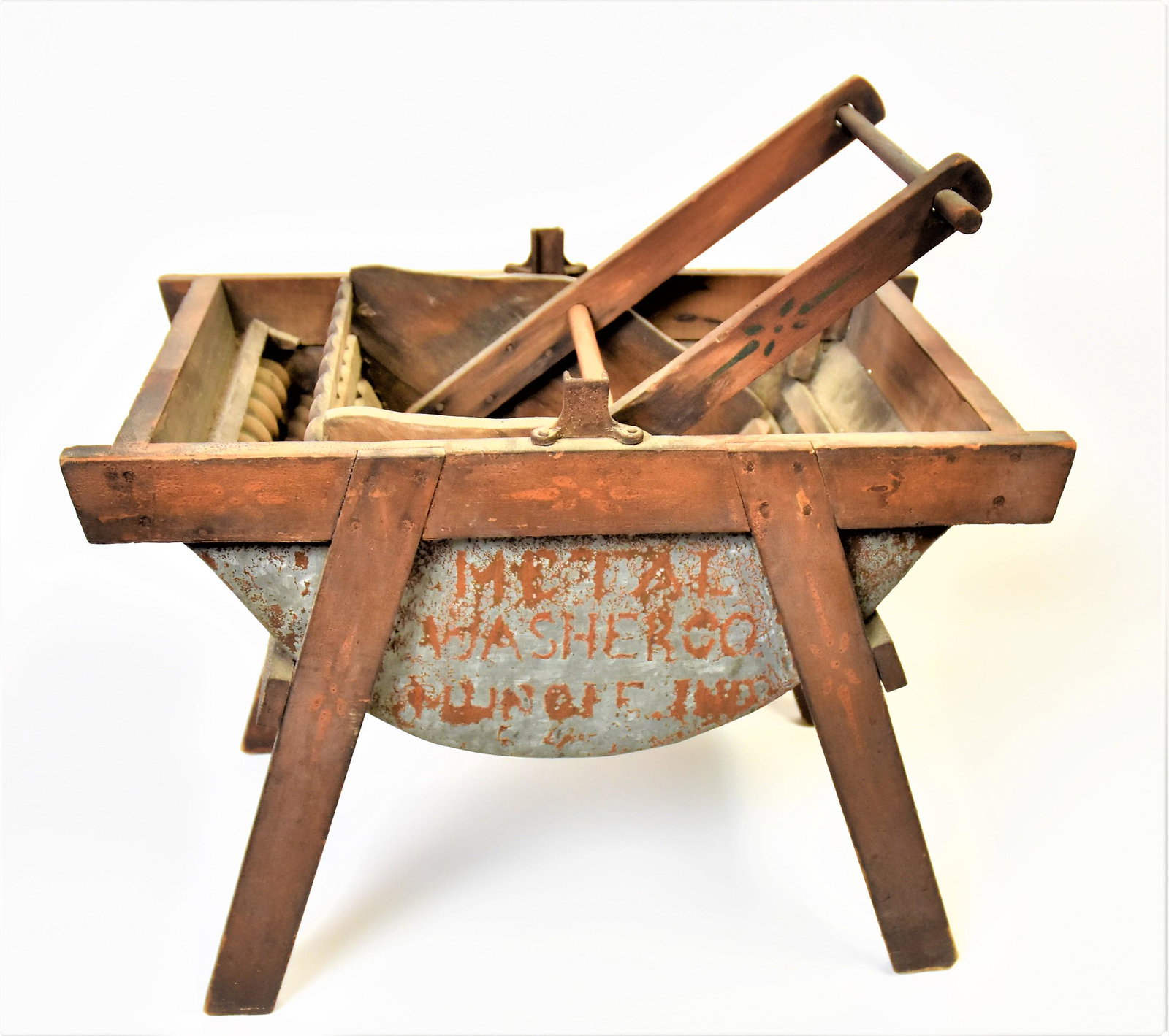 Miniature Rocker Washer: Tin and mixed woods in original painted finish, 9 x 11 1/2 x 22" high. Condition Very Good.