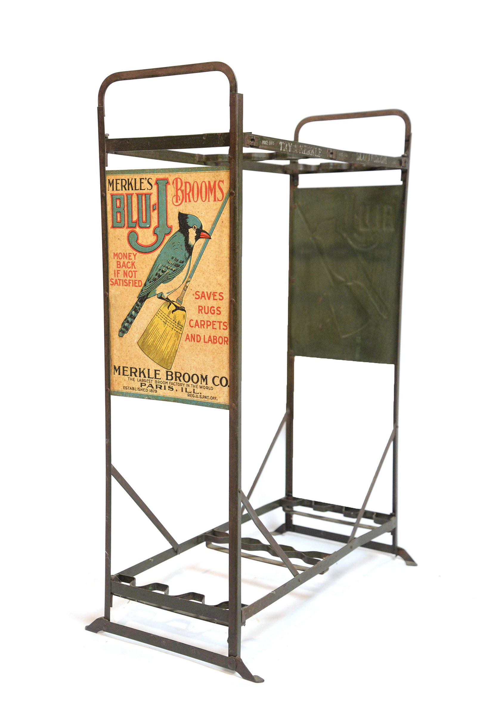 Merkles Blue-J Brooms Floor Display: Steel and chromolithographed tin with 10 x 14" tin sides on each end with illustration of blue jay resting atop a broom, olive green painted steel, with text on top bar reading: Try Merkle Blue-J Broo