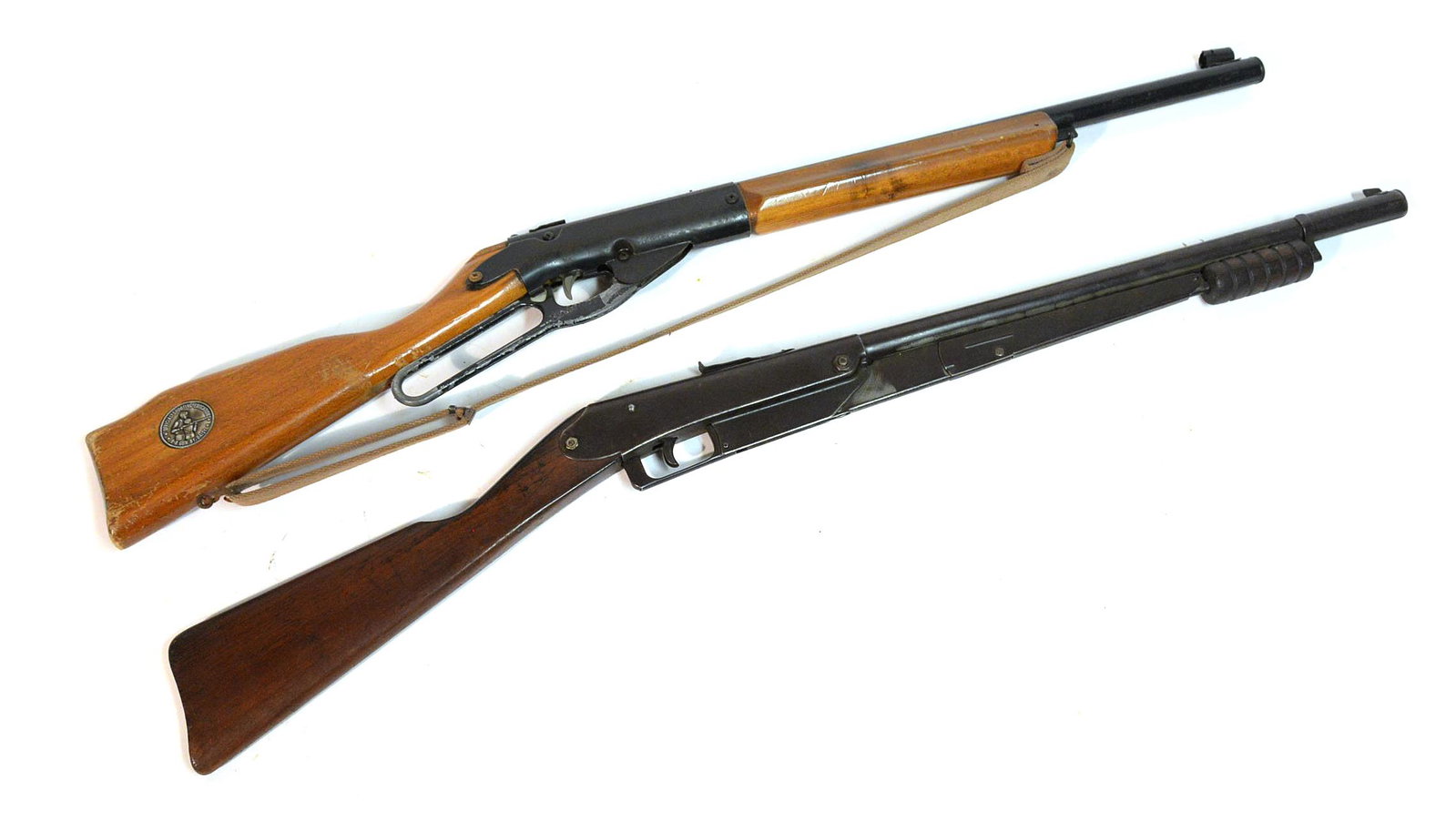 Daisy No. 25 BB Gun Plus: Lot of two including a nice pump action BB gun marked on top of barrel:Daisy No. 25 Daisy MFG. Co. Plymouth, Mich., U.S.A. Patents Pending with original sights, walnut stock and forearm,, original bro