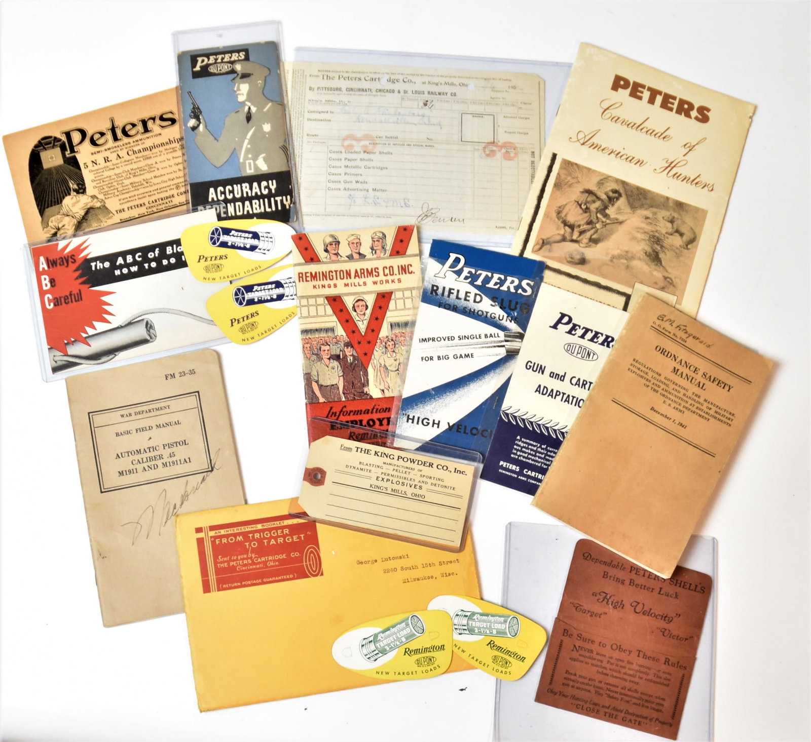 Peters, King & Remington Items: Lot of 17 paper ephemera, including the following Peters items: two lithographed card stock cards, ovalish with Peters Target Load shell, 3 ½ x 2”; plus huning license pouch in brown card s