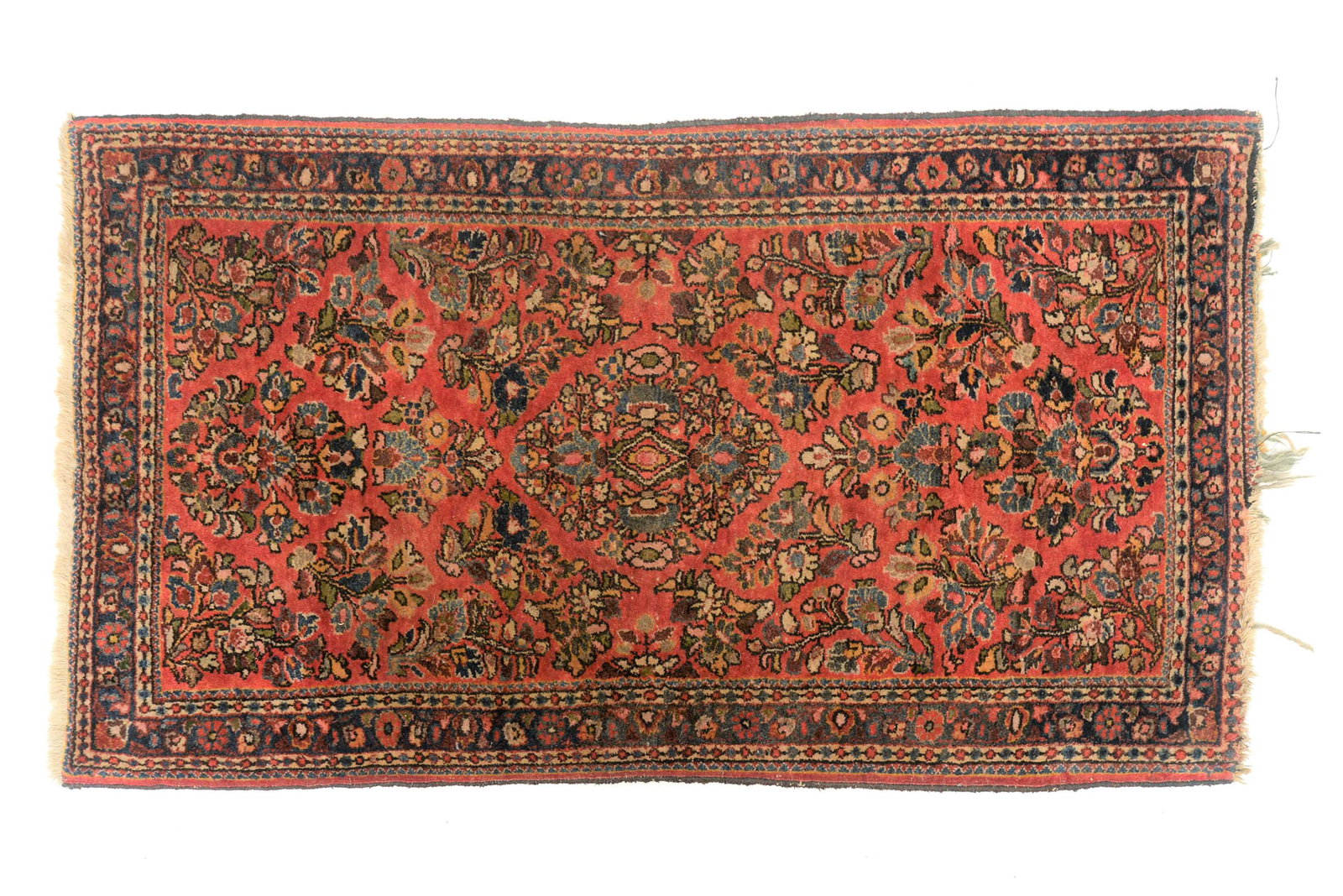 Persian Area Rug: Sarouk with floral pattern and three borders, red field, 26 x 44” Condition Very Good.