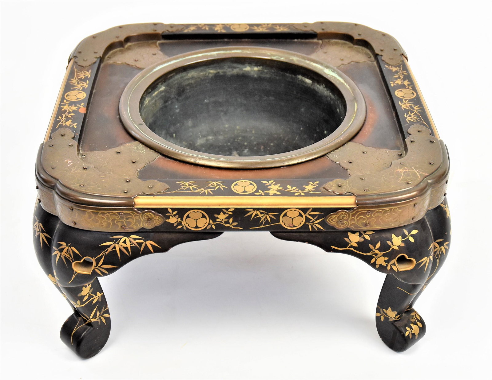 Bronze & Lacquered Japanese Brazer: Edo period with cabriol legs with pierced knees decorated with matt gilt Mon (crests) branching bamboo and fruit,on lacquered bronze colored ground, bronze mounts with stylized floral and undecorated 