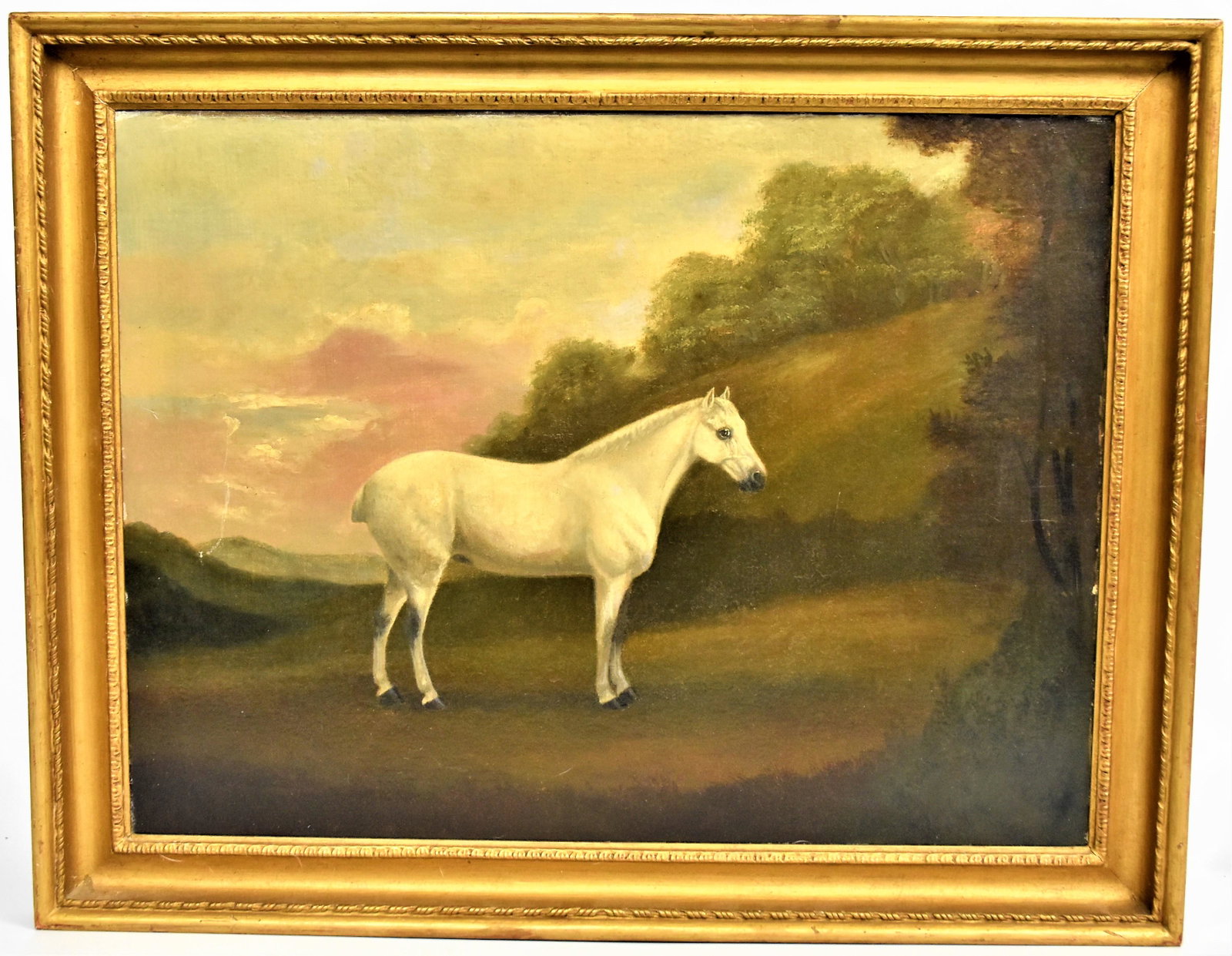 Early Equestrian Painting: Anonymous oil on canvas, likely English with bob tailed white horse in landscape, 23 1/2 x 18" in period gilt frame, 21 1/2 x 27 1/2". Condition Relined else Fine.