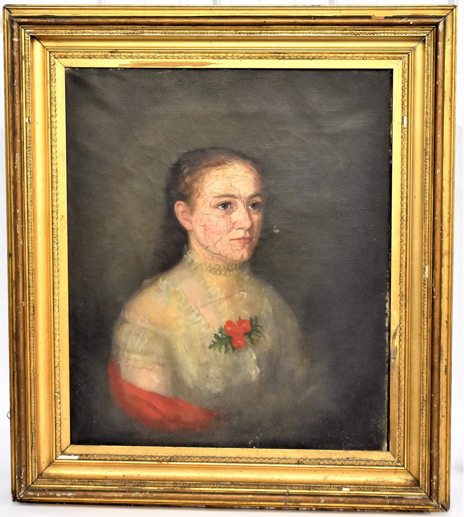 Oil Portrait of Lady in white dress: Anonymous oil on canvas half length portrait of brunet in white lace dress with rose at breast, double pearl choker, circa 1850, 22 x 26” in original gilt frame, 30 x 34”. Condition crazing and ne