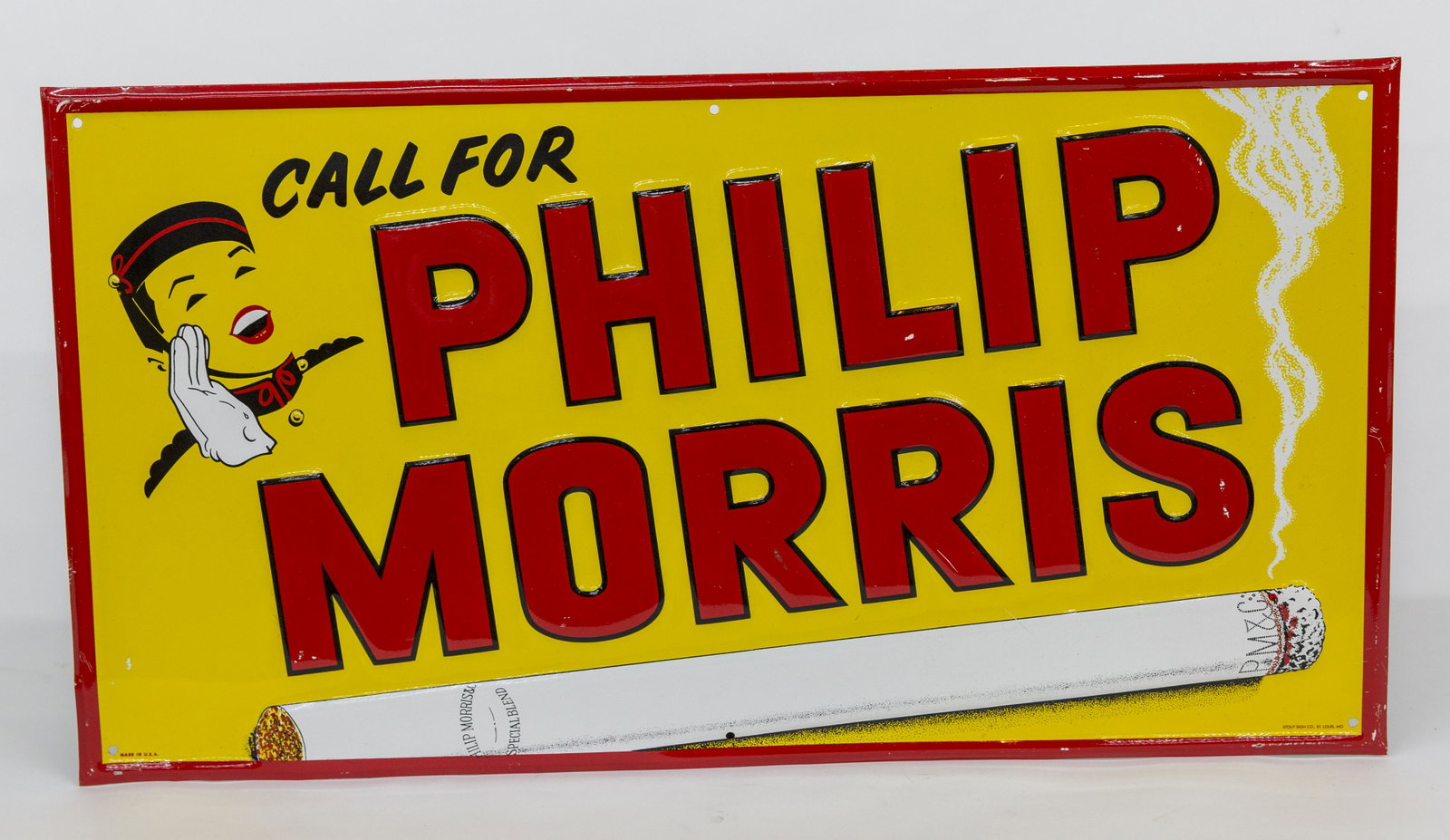 Philip Morris Metal Sign: Chromolithographed and embossed with bell hop tp left, burning cigarette along lower margin and text reading: Call For Philip Morris, marked lower left Made In U.S.A. and right Stout Sign Co. St. Loui