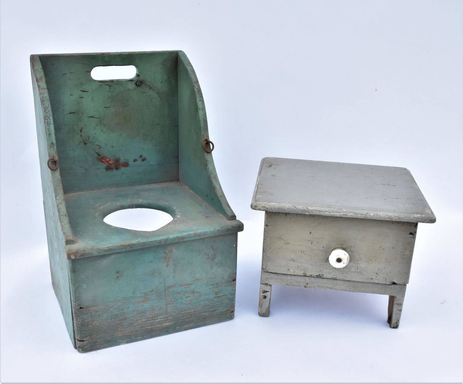 Painted Shoe Shine Stand & Potty Chair: Lot of two, including gray painted shine stand in pine with drawer with porcelain knob, cut out arched ends, tools inside, 13 x 11 ½ x 10” high; and childs potty chair in original green p