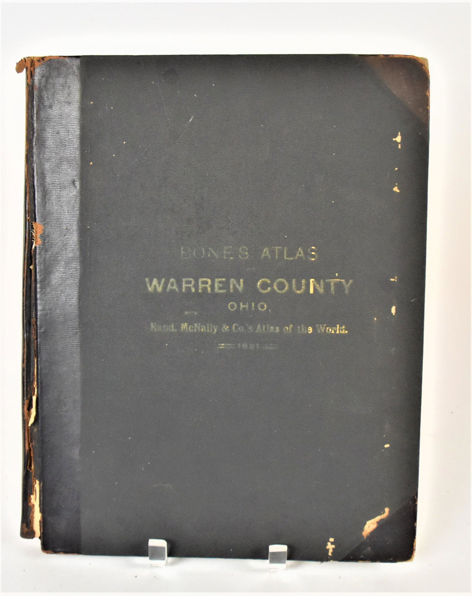 1891 Warren Co. Ohio Atlas: Folio, 11 11/2 x 15” half red calf bound with black buckram boards with embossed title on cover, full title being: Complete Atlas of Warren County, Ohio Containing Maps of the County and of Each