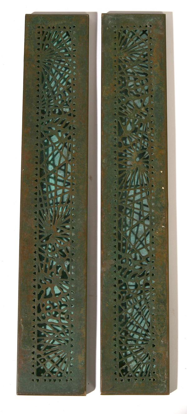PAIR OF TIFFANY STUDIO BRONZE BLOTTER ENDS: In spider web pattern and marked "Tiffany Studios, New York". Good condition. 12" long.