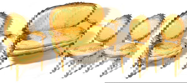 LOUIS XV STYLE GILT 7 PC. SETTEE AND CHAIRS SET: Late 19th Century includes 48" wide settee, two matching arm chairs and four side chairs. All with reeded and carved legs, reeded and floral carved seat frames and oval backs with rose carved crests i