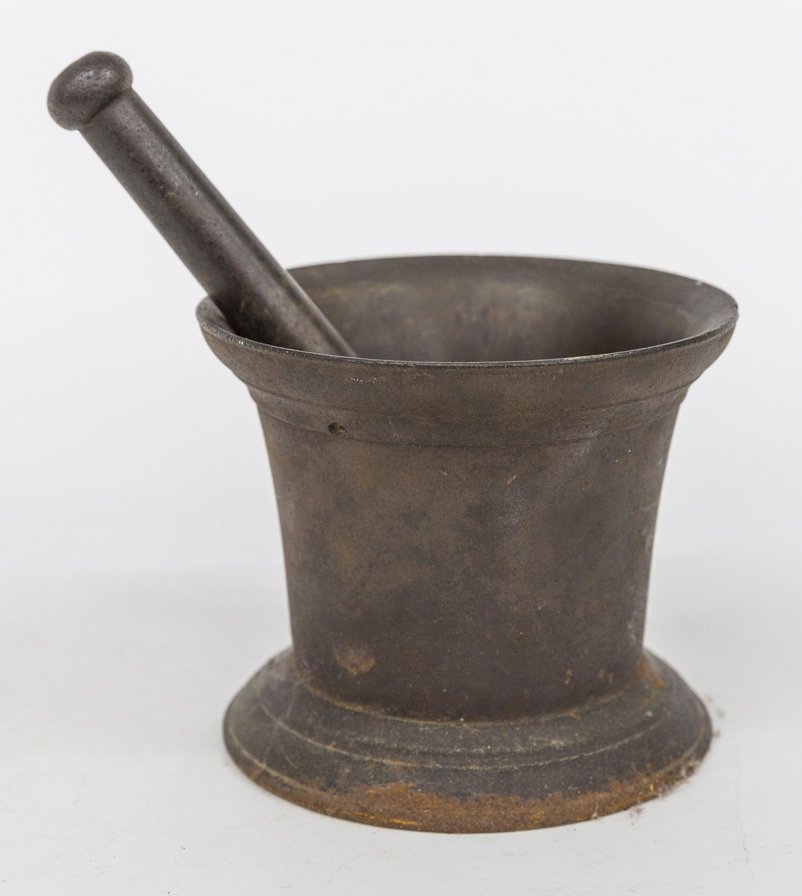 Apothecary Cast Iron Mortar & Pestal: Trade Sign type typically placed in store front window, 7" diameter x 6" high with pestal 10 1/4" lone, all with nice brown patina. Condition Fine.