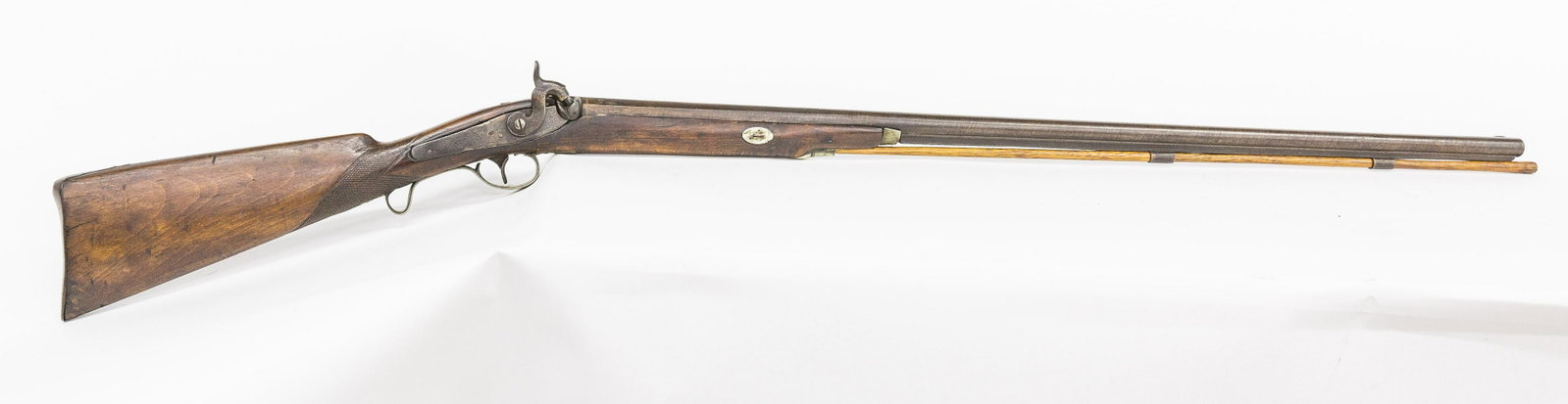 Early Percussion Shotgun: 37" long round to octagonal 12 u Damascus unmarked steel barrel, with original ram rod held by two steel and one nickle sleeve with nickle end cap and engraved trigger guard, feather engraved lock pla
