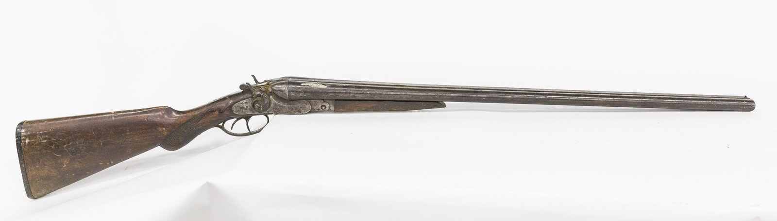 N.Y. Arms Double Barrel Shotgun: 12 gauge with left side of frame marked New York Arms Co./New York, 30" long round barrels marked Genuine Armory Steel Choke Bored on left, central rib ripple engraved, serial number 166180 on frame a
