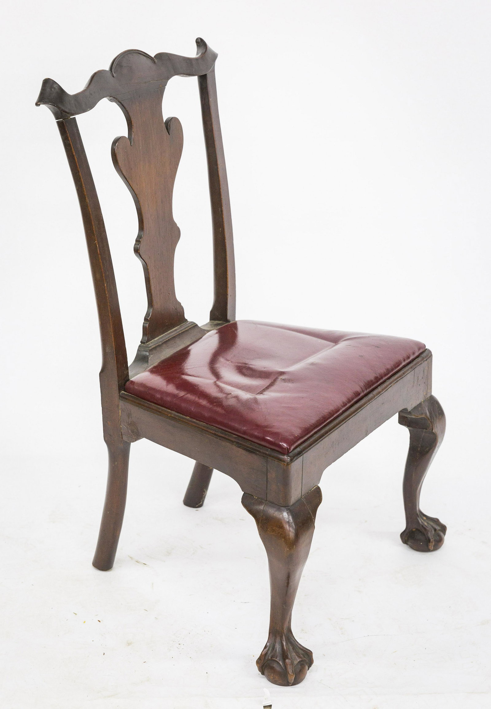 Mahogany Chippendale Side Chair: American circa 1760 with eared yoke crest with nice cut-out splat, slip seat in red leather, cabriol legs with claw & ball front feet, old finish, nice old patina, 24 x 19 x 38" high, seat at 18". Con
