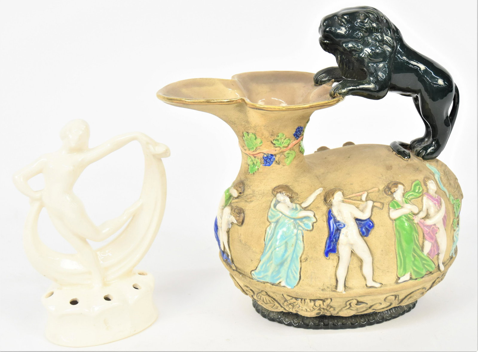 Czech Ewer & Flower Frog: Lot of two including an unusual terra cotta ewer with relief classical figures in polychrome enamel glaze with rampant lion handle in green enamel glaze, marked on base Czecho-Slovakia, twice with oth