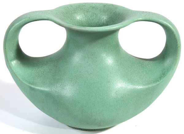 TECO DOUBLE HANDLED POTTERY VASE: Green mat glaze. Stamped "Teco" mark and #297. Fine condition. 5 1/2" H x 8 1/2" W.