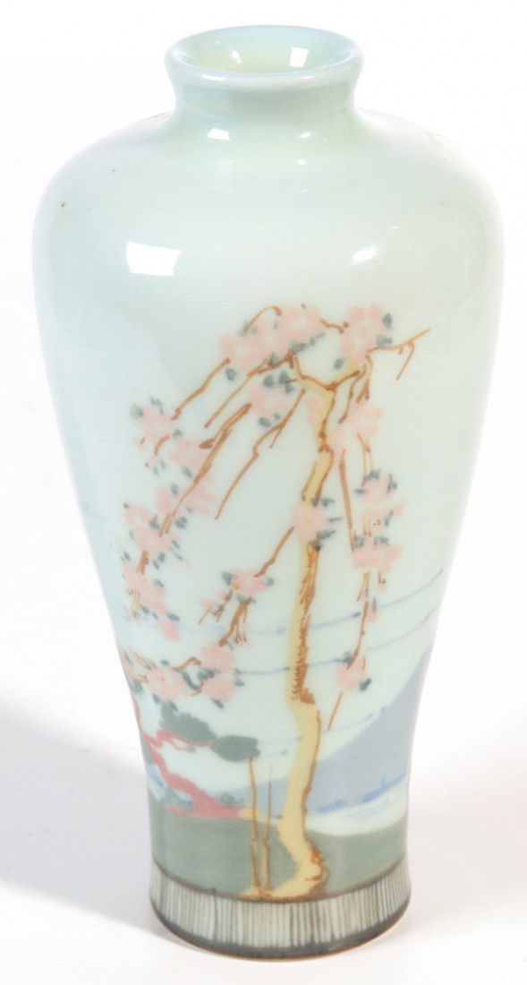 ROOKWOOD DECORATED PORCELAIN VASE BY ARTHUR CONANT: A wonderfully executed vase with lake scene and trees in foreground. Dated 1919. Shape #2306. Artists monogram is inscribed. Uncrazed. Very small repair to bottom rim; otherwise excellent condition.