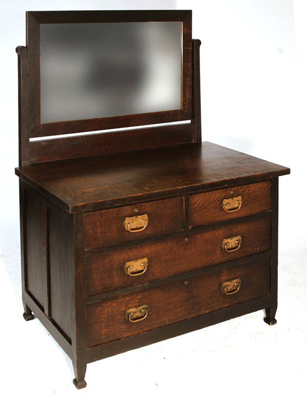 ROYCROFT DRESSER WITH MIRROR: Two small drawers over two drawers; copper pulls; excellent dark brown finish. Signed with Orb & Cross mark on front post. Some lighting to top; small splinter chip to top right drawer; back panel top