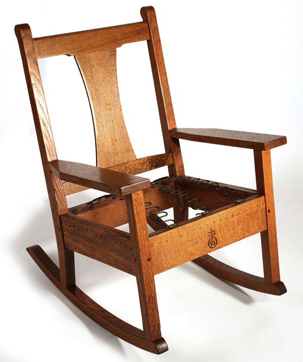 ROYCROFT ARM ROCKER: With wide slat back. Signed with carved Orb & Cross mark. Refinished; missing leather seat and tacks. Very good condition. 36" H x 25" W x 31" D.