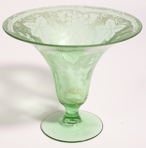 PAIRPOINT ART GLASS VASE: Green blown glass trumpet vase with acid cut vintage motifs. 8.25" x 7.25" high.