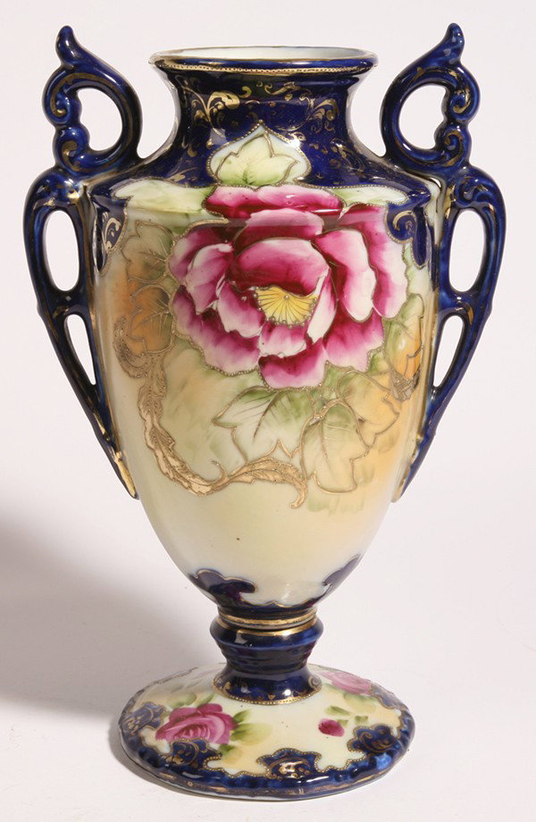 BOLTED COBALT BLUE NIPPON URN: Decorated with painted roses with cobalt ground and gilt highlights. 12.25" high.