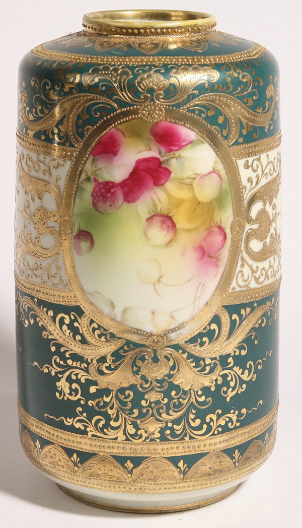 LG. NIPPON VASE: Decorated with gilt scroll work and floral panel on green ground. 12" high. Drilled for lamp.