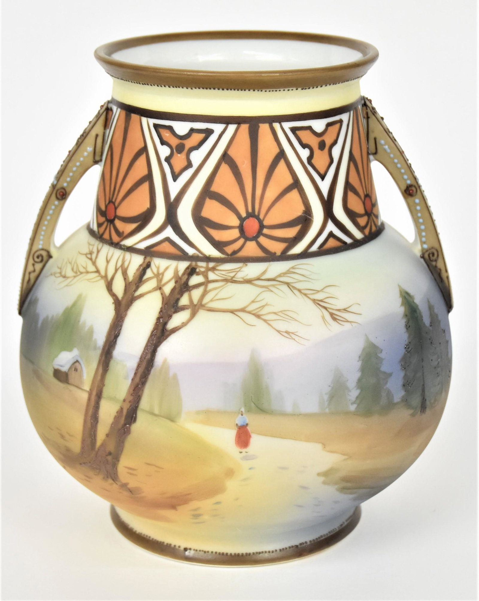 Nippon Country Scenic Handled Vase: Person walking a trail meandering through pine trees. Raised and beading on handles. Decorative painted neck. 6 5/8"tall M in wreath backstamp. Clean vessel in good condition.