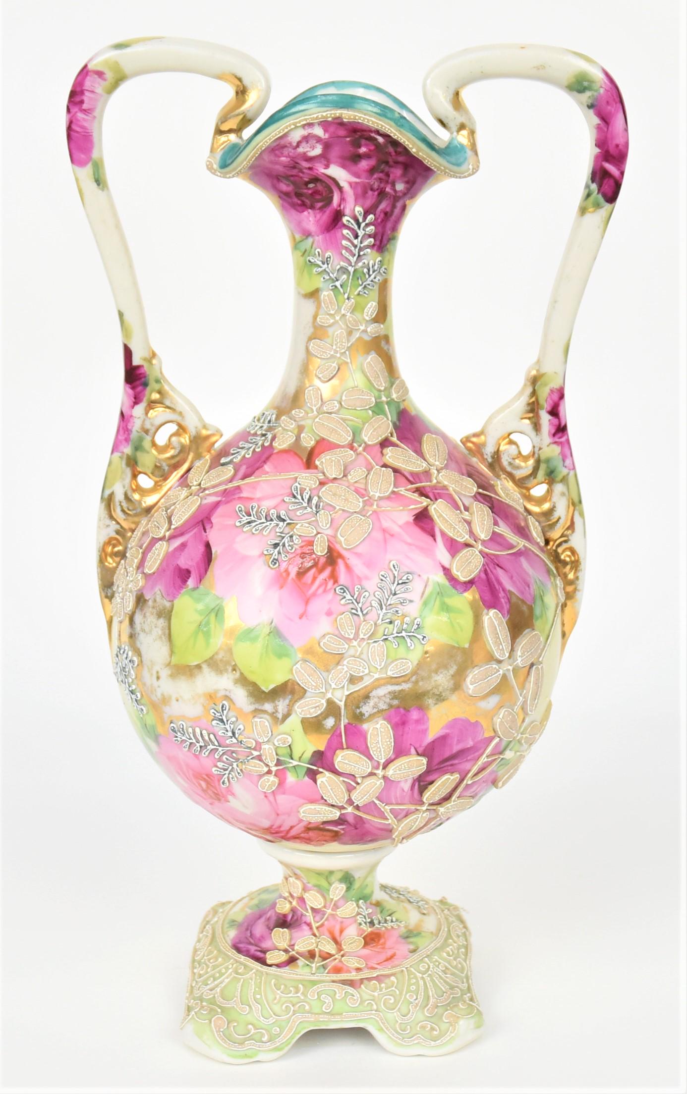 Nippon Moriage Handled and Bolted Vase: Ruby and pink roses on sparse gold. Nice Moriage design. 12" tall. Unmarked.