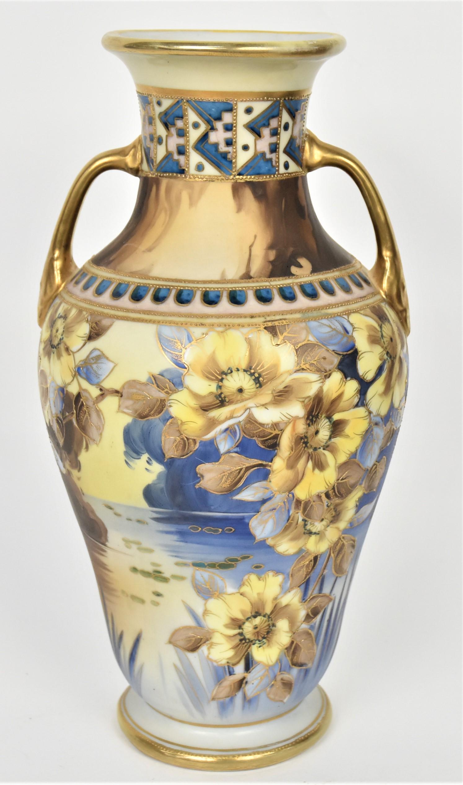 Nippon Floral and Scenic Vase: With gold handles and raised gold trim. 11"trim, M in wreath logo. Stylish and in good condition.