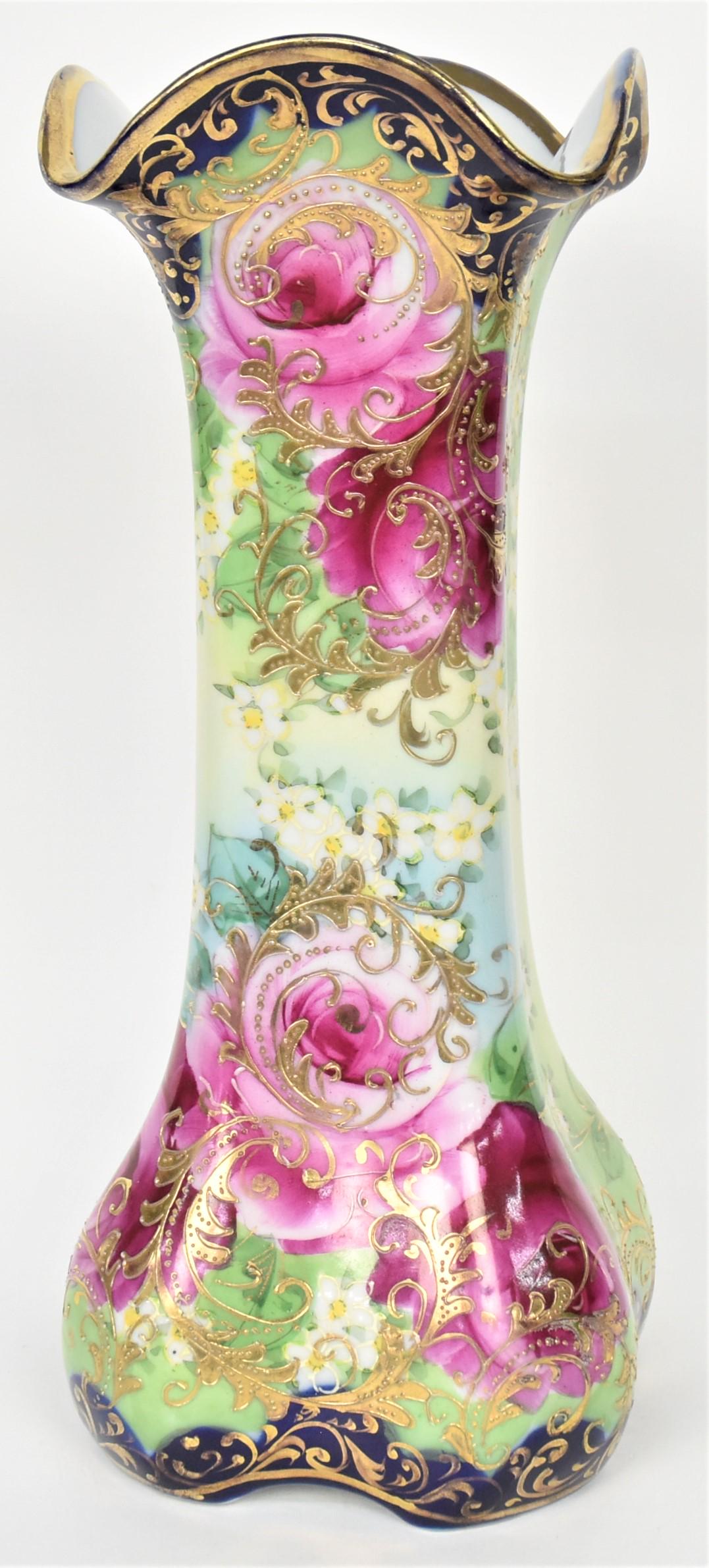 IE&C Co. Nippon Cobalt Blow-Out Vase: Featuring large ruby roses enhanced by raised gold scrolling. Deep scalloped rim. 12" tall. Highly attractive and in good condition.